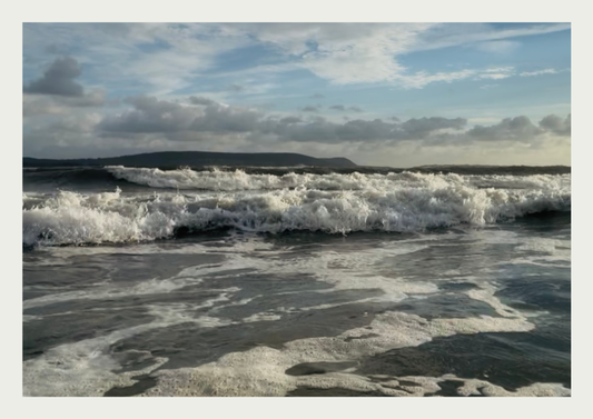 Wild waves at Burry Port beach in South Wales, our favourite wild swimming and dipping spot.