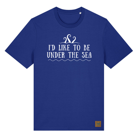 Deep blue t-shirt with white print showing octopus tentacles and the text I'd Like To Be Under The Sea from the Beatles' iconic song Octopus's Garden. We love to wear this tee after having sea swimming adventures at our home on the coast.