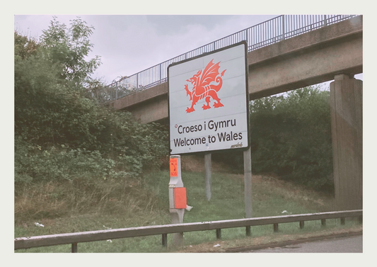 The sign welcoming the Waves and Wild Water family to Wales, and their new life by the sea.