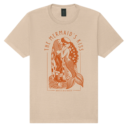 The Mermaid's Kiss washed cotton t-shirt in Gilded Sand, featuring a metallic copper hand screen-printed sailor and mermaid embracing, inspired by Klimt's The Kiss. Exclusively designed and printed by Waves & Wild Water in South Wales.