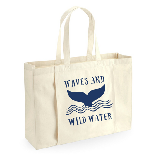 Wild swimmers and sea dippers LOVE this towel tote bag for it's large capacity and fab outer pocket for towels. Shown here in natural organic cotton with the Waves and Wild Water whale tail logo printed in ocean blue.