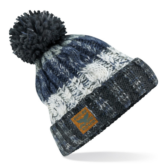 We love this great knitted beanie hat with a fluffy pom pom on top. Knitted in shades of grey, the colours remind us of frost morning swims, making this the perfect bit of kit to cosy up in after a dip.
