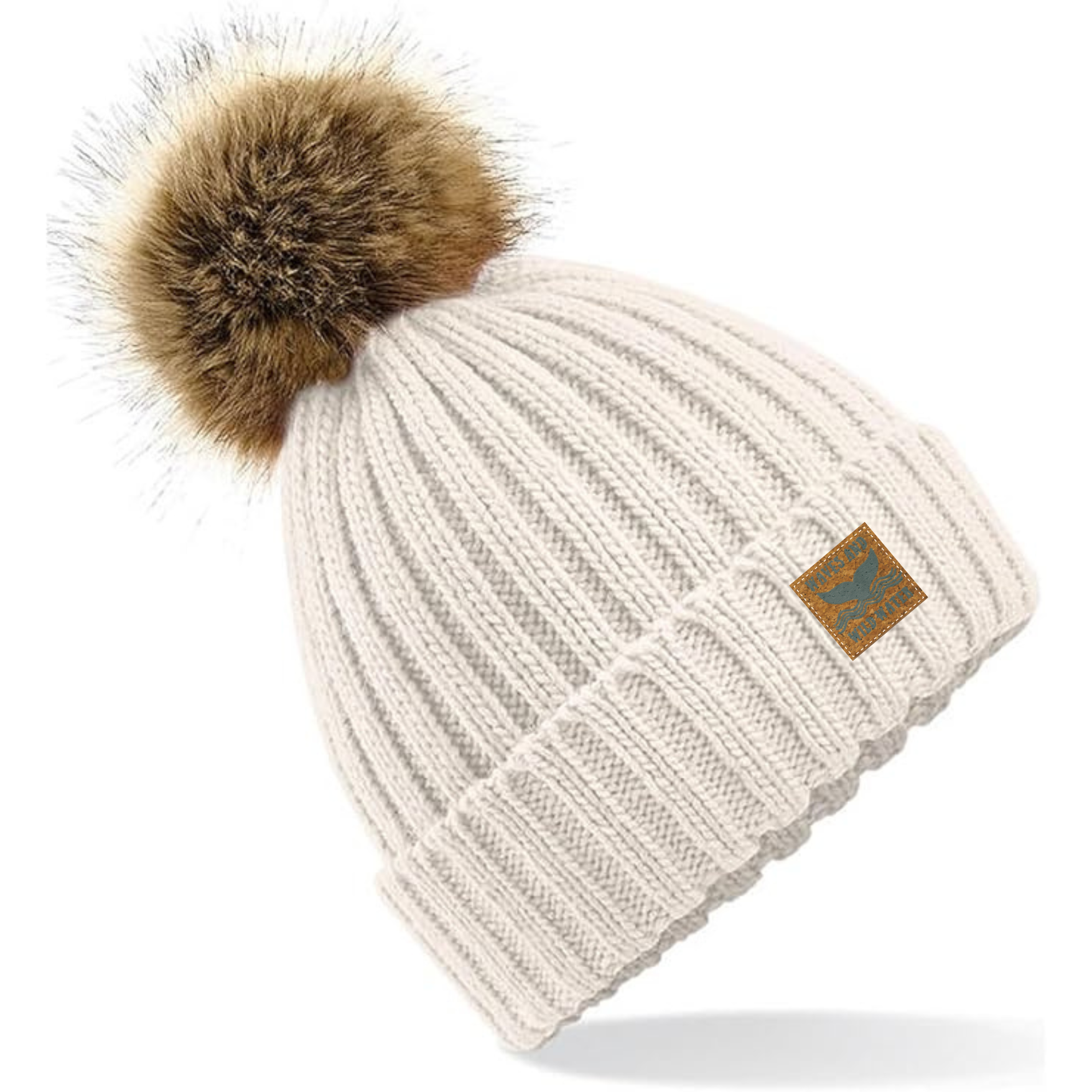 We love this snug knitted beanie at Waves and Wild Water. Not only does it keep your ears toasty after a cold water swim, the gorgeous cream colour and statement faux fur pom pom, makes any outfit on point.