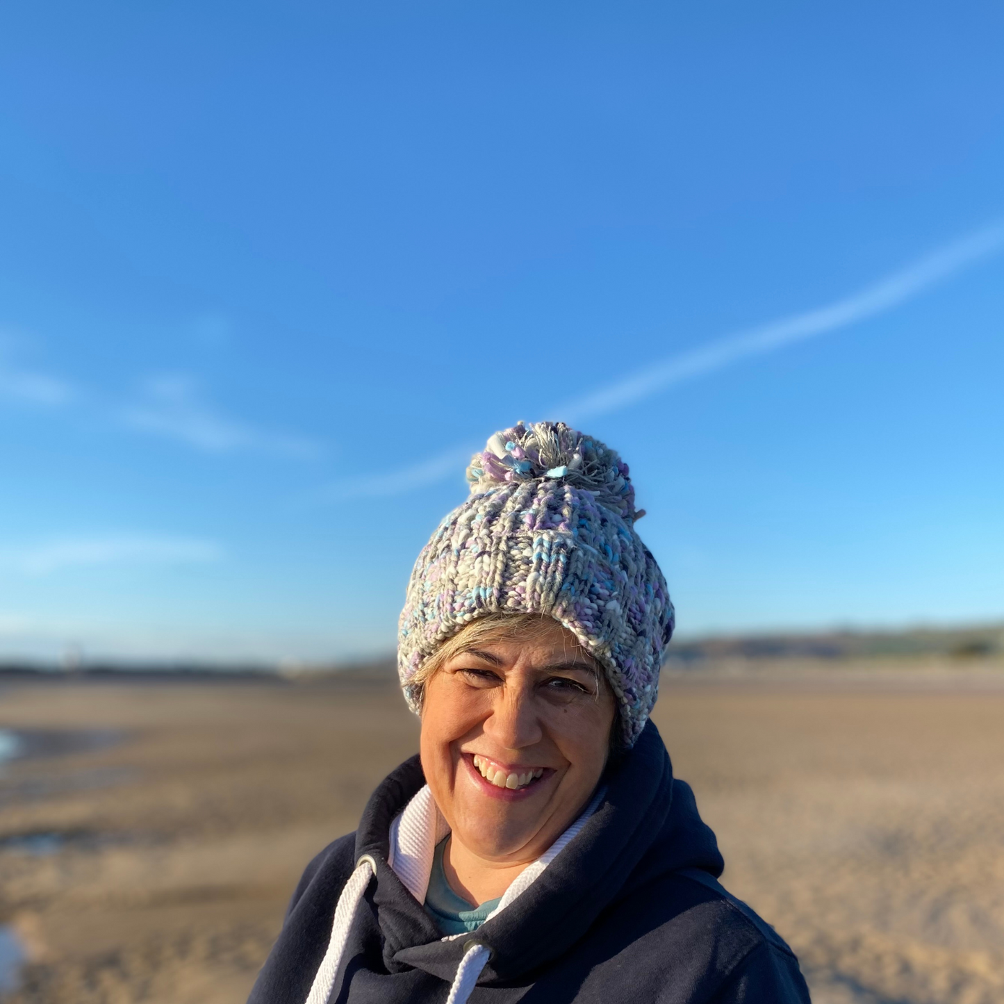 Our Frosty Heather beanie is destined to keep you warm and comfortable during your outdoor escapades. Waves and Wild Water owner Claire, wears hers on the beac in Wales where she goes for her cold water dips.