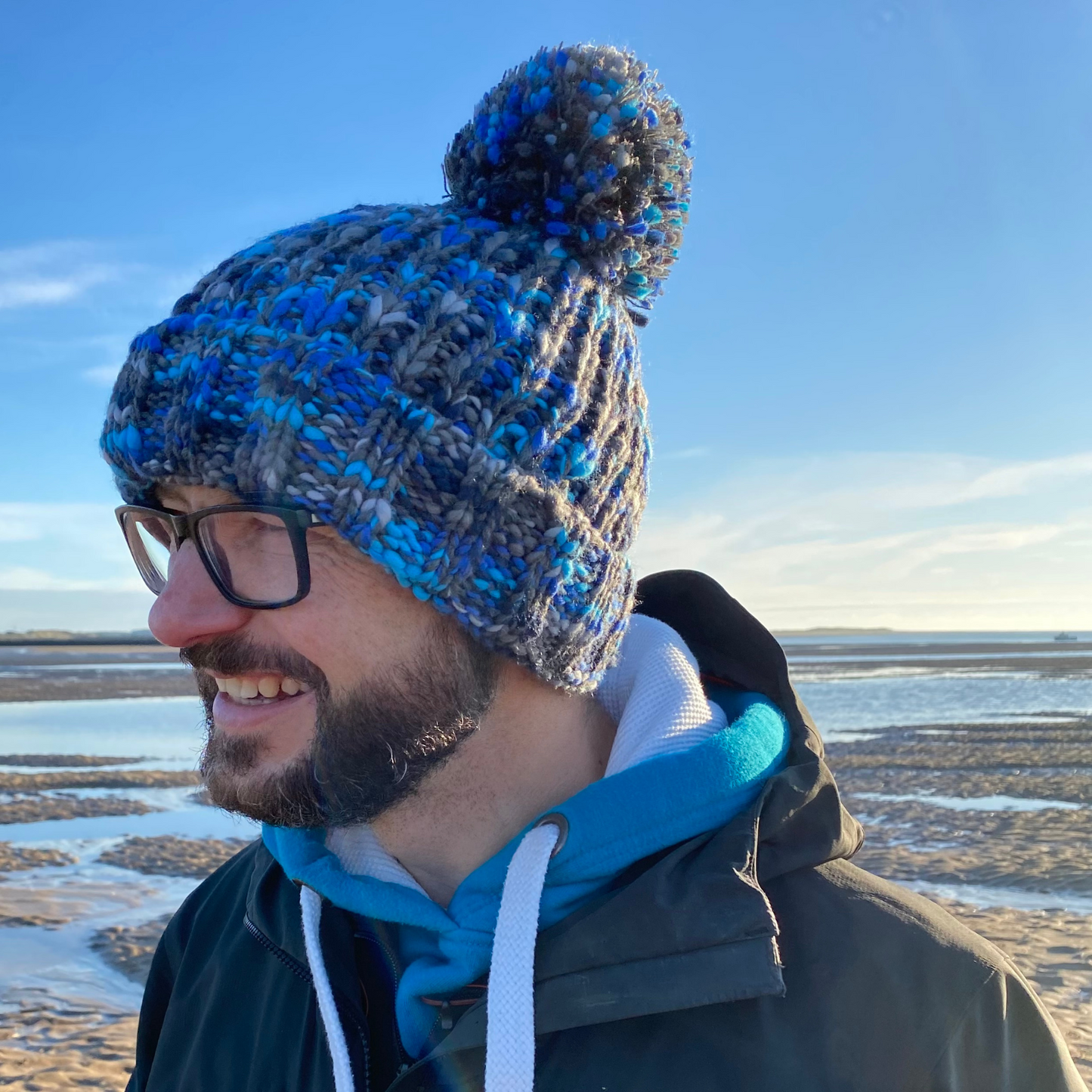 This gorgeous Ice Plunge chunky knitted beanie hat is available from Waves and Wild Water, and is loved by the cold water dipping community. We LOVE the shades of grey and blue which are reminiscent of icy seas.