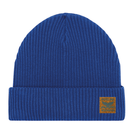 Swimmer Blue fisherman beanie hat with vegan cork 'leather' label. This bestselling hat is loved by wild swimmers, sea dippers, and the cold water community.