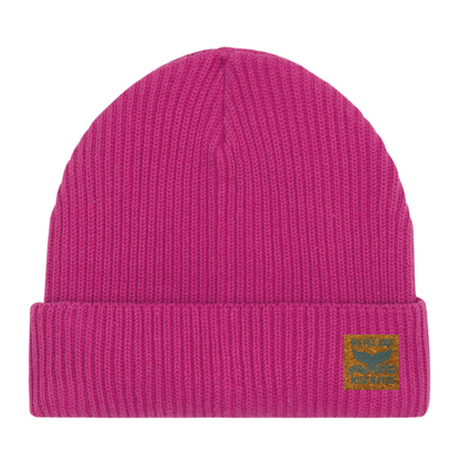 Water Lily fisherman beanie hat with vegan cork 'leather' label. This fabulous bright pink hat from Waves and Wild Water is loved by wild swimmers, sea dippers, and the cold water community.
