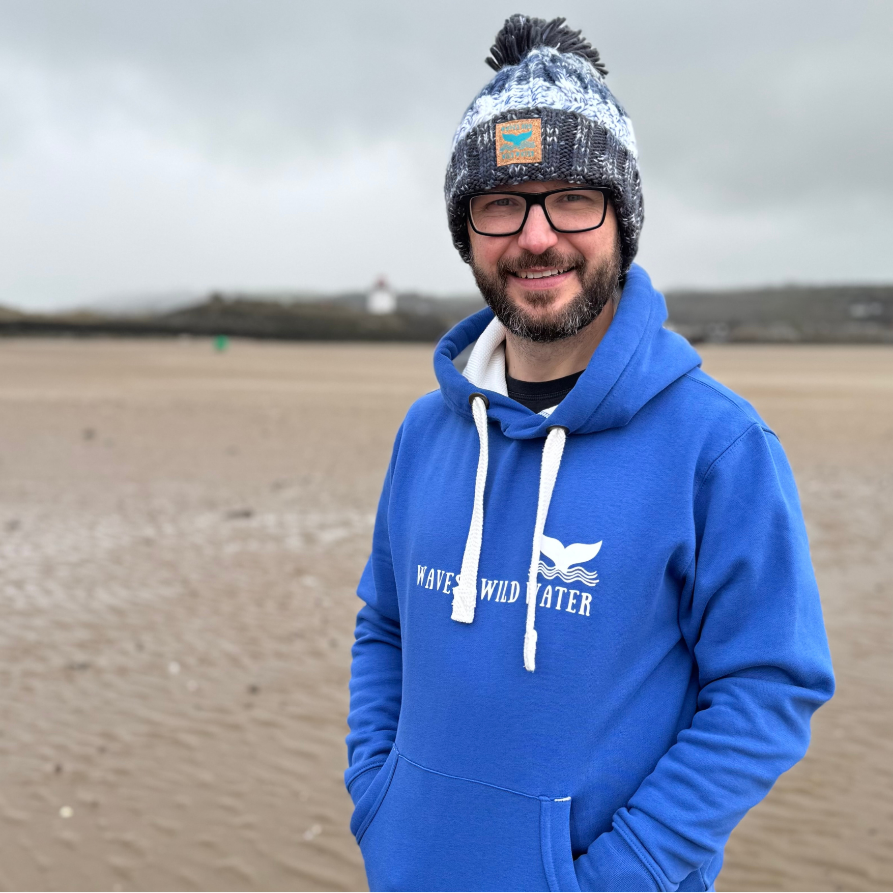 There's no wild swimming for Waves and Wild Water owner Glenn today, but I think he's secretly glad he doesn't have to take his super warm and cosy bright blue Swimmer hoodie off.