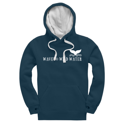 The front of our exclusive Waves and Wild Water heavyweight hoodie in deep sea blue. This hoodie has a contrasting white waffle hood lining and matching cord. The logo is displayed across the front in white vegan ink.