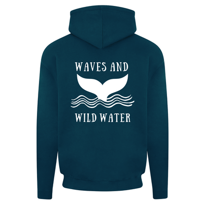 The back of our Waves and Wild Water heavyweight hoodie in deep sea blue. The large whale tail logo is printed in white vegan ink, making this hoodie a firm favourite for any open water enthusiast or sea based adventurer.