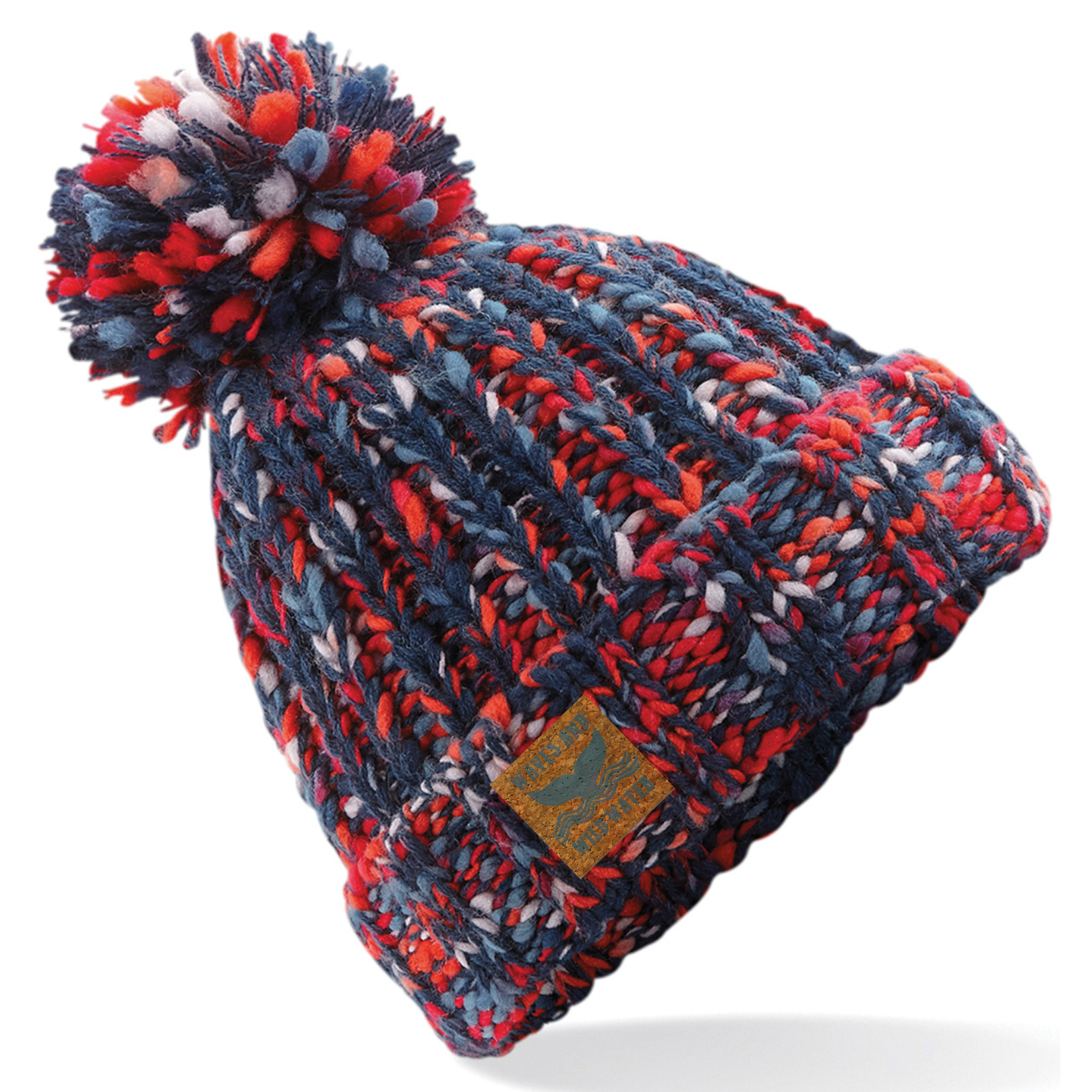 A red and blue chunky knitted beanie hat with a pom pom.
