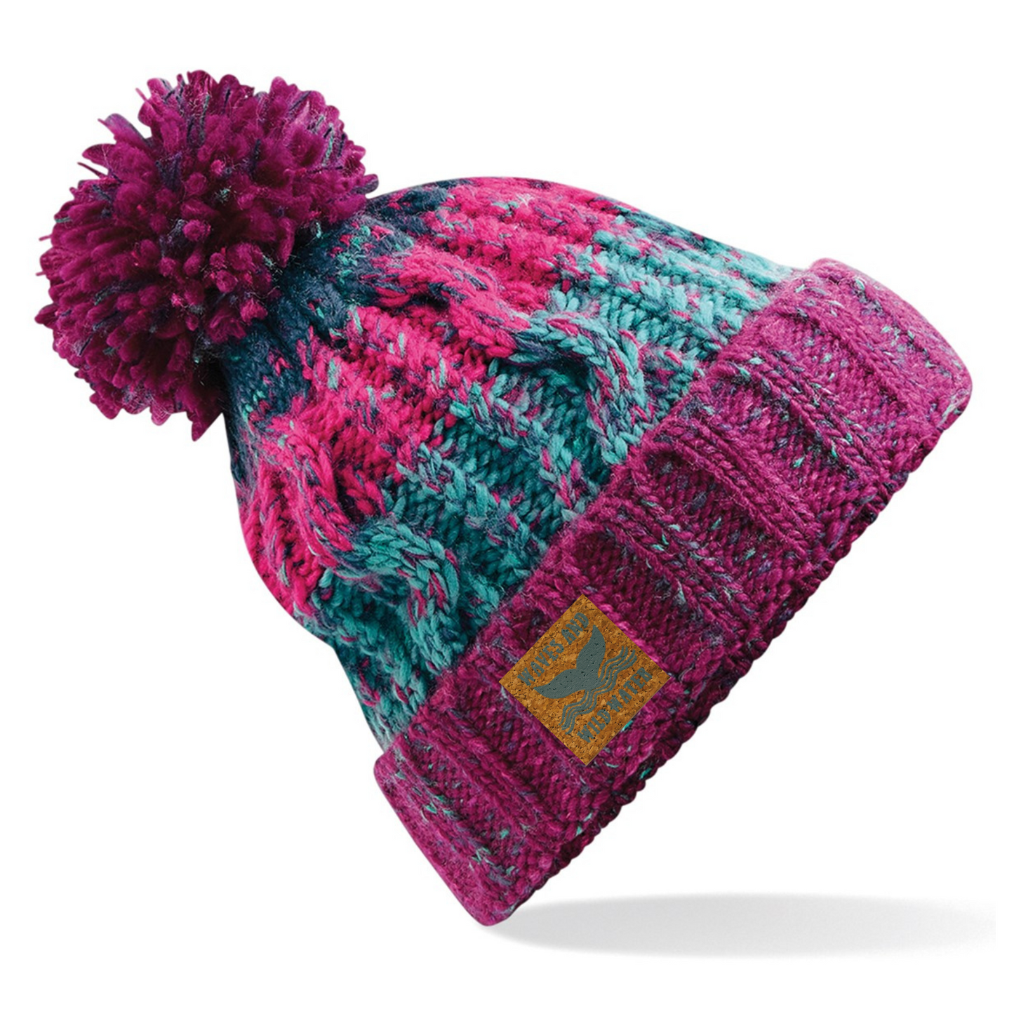 A pink and blue knitted pom pom beanie hat.